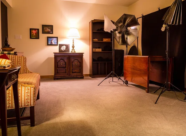 studio, bonus room, photography studio, umbrella reflectors, carpet, table, sofa, shelves, amateur photography, lighting, couch, craft room, brown room, brown table, brown photography, brown couch, brown umbrella, studio, studio, studio, studio, studio, photography studio, carpet, carpet, carpet, carpet. Which studio mistakes does a well-planned small space prevent?
